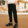 Pantaloni țesuți „Black”