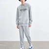 Pantaloni sport conici, călduroși, cu căptușeală din fleece și litere „Negru Gri”